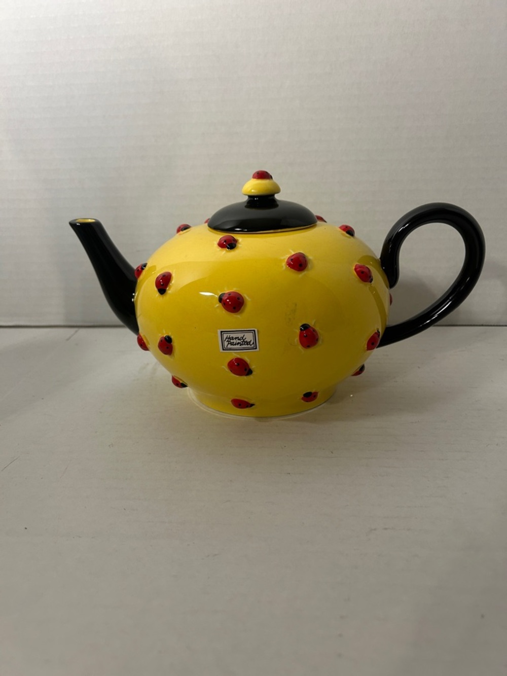 Department 56 Yellow Teapot with Black Handle and Red Ladybug Accents